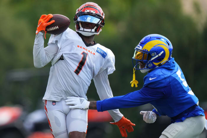 Cincinnati Bengals wide receiver Ja'Marr Chase (1) completes a one-handed catch as Los Angeles Rams cornerback Jalen Ramsey (5) defends during a joint practice, Wednesday, Aug. 24, 2022, at the Paycor Stadium practice fields in Cincinnati. Los Angeles Rams At Cincinnati Bengals Joint Practice Aug 24 0061
